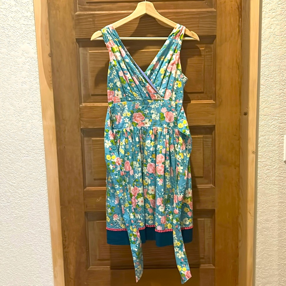 Teal floral Matilda Jane dress with cute dark blue at the bottom